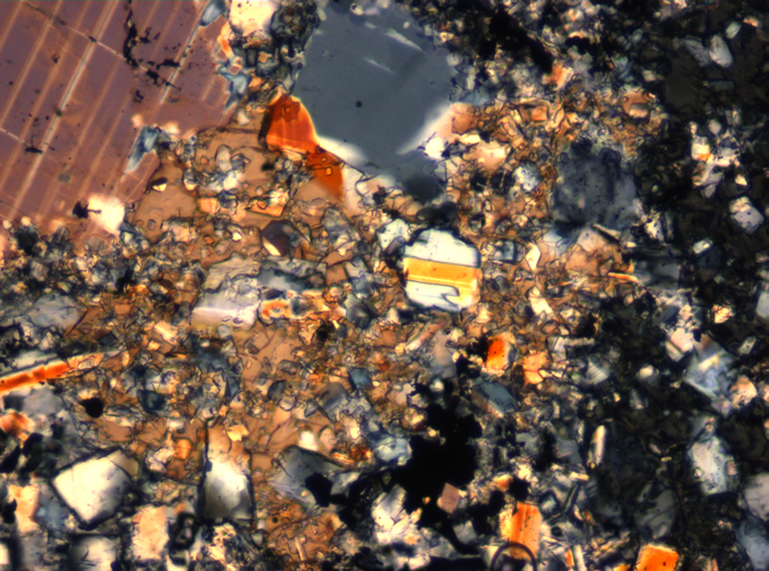 Thin Section Photograph of Apollo 16 Sample 65015,164 in Cross-Polarized Light at 2.5x Magnification and 2.85 mm Field of View (View #43)