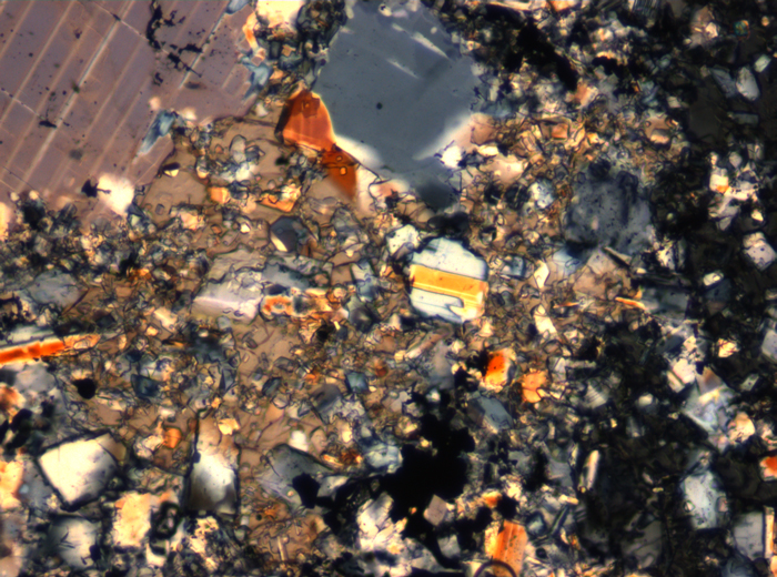 Thin Section Photograph of Apollo 16 Sample 65015,164 in Cross-Polarized Light at 2.5x Magnification and 2.85 mm Field of View (View #44)