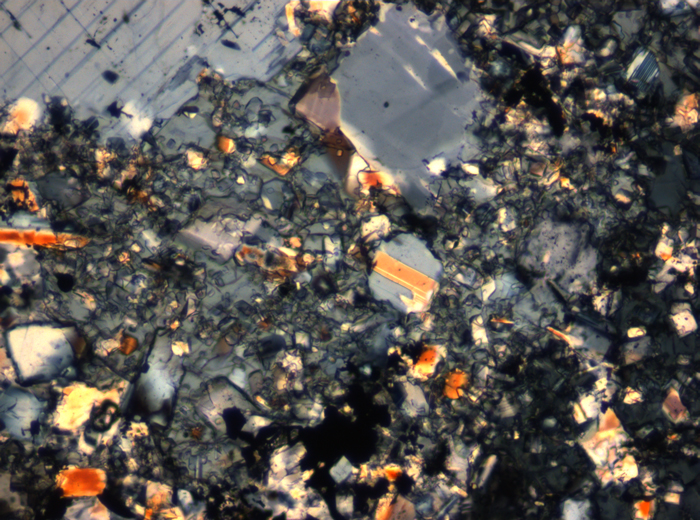 Thin Section Photograph of Apollo 16 Sample 65015,164 in Cross-Polarized Light at 2.5x Magnification and 2.85 mm Field of View (View #47)