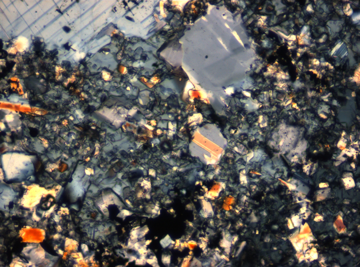 Thin Section Photograph of Apollo 16 Sample 65015,164 in Cross-Polarized Light at 2.5x Magnification and 2.85 mm Field of View (View #48)