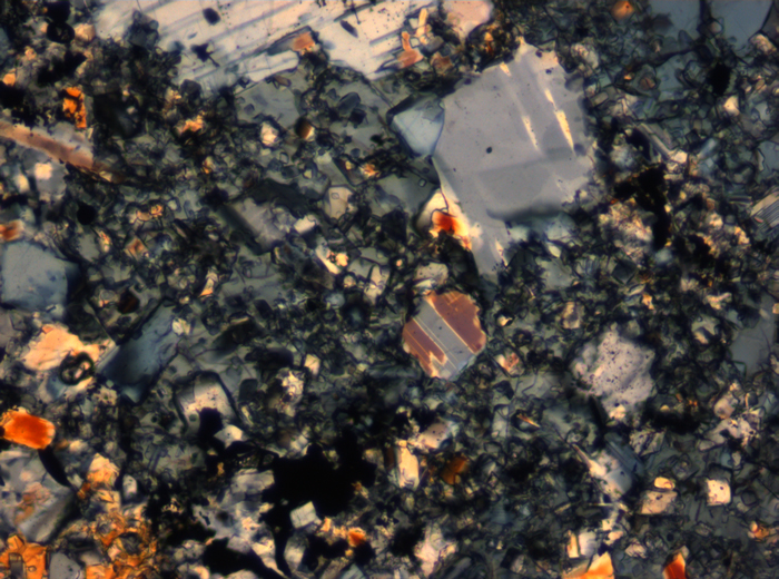 Thin Section Photograph of Apollo 16 Sample 65015,164 in Cross-Polarized Light at 2.5x Magnification and 2.85 mm Field of View (View #51)