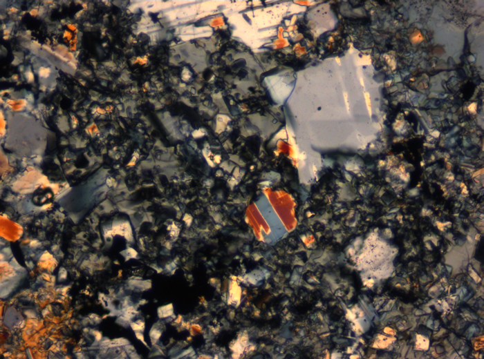 Thin Section Photograph of Apollo 16 Sample 65015,164 in Cross-Polarized Light at 2.5x Magnification and 2.85 mm Field of View (View #53)
