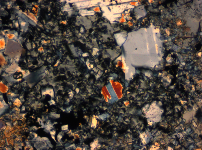 Thin Section Photograph of Apollo 16 Sample 65015,164 in Cross-Polarized Light at 2.5x Magnification and 2.85 mm Field of View (View #54)