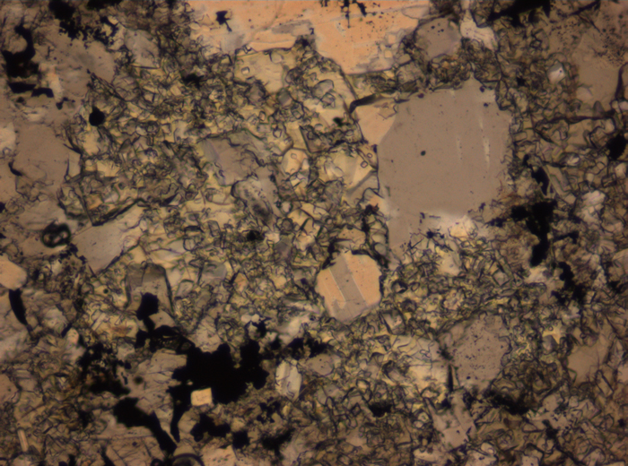 Thin Section Photograph of Apollo 16 Sample 65015,164 in Plane-Polarized Light at 2.5x Magnification and 2.85 mm Field of View (View #54)