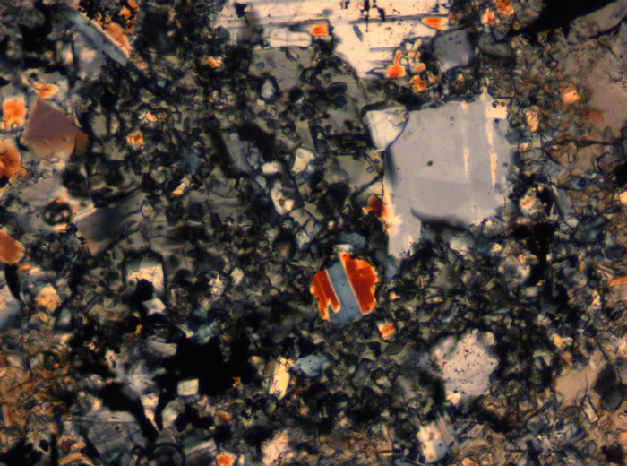 Thin Section Photograph of Apollo 16 Sample 65015,164 in Cross-Polarized Light at 2.5x Magnification and 2.85 mm Field of View (View #55)