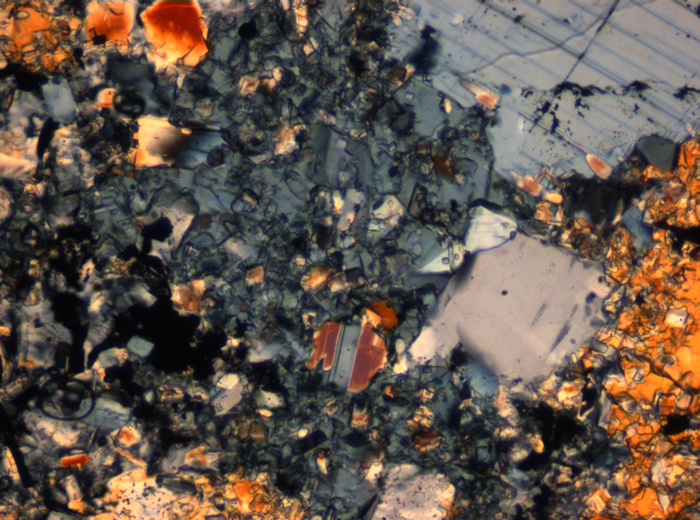 Thin Section Photograph of Apollo 16 Sample 65015,164 in Cross-Polarized Light at 2.5x Magnification and 2.85 mm Field of View (View #62)