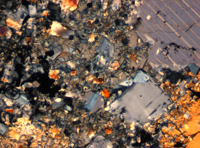 Thin Section Photograph of Apollo 16 Sample 65015,164 in Cross-Polarized Light at 2.5x Magnification and 2.85 mm Field of View (View #65)