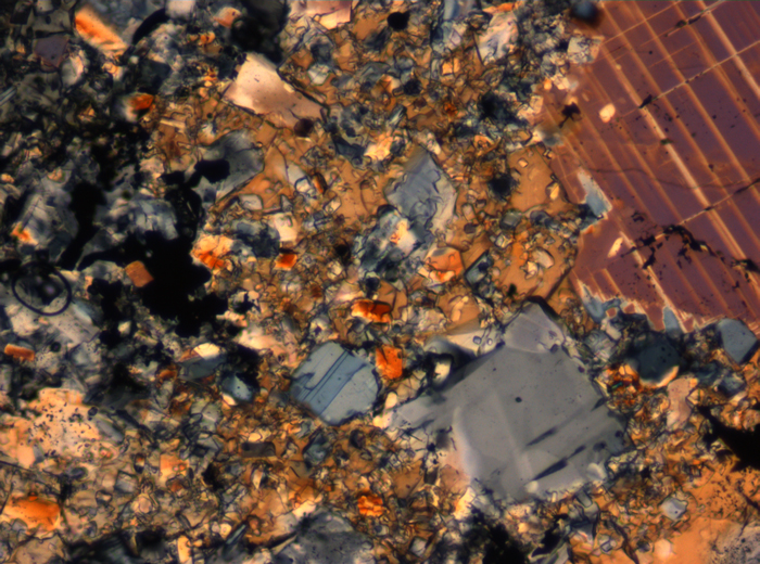 Thin Section Photograph of Apollo 16 Sample 65015,164 in Cross-Polarized Light at 2.5x Magnification and 2.85 mm Field of View (View #67)