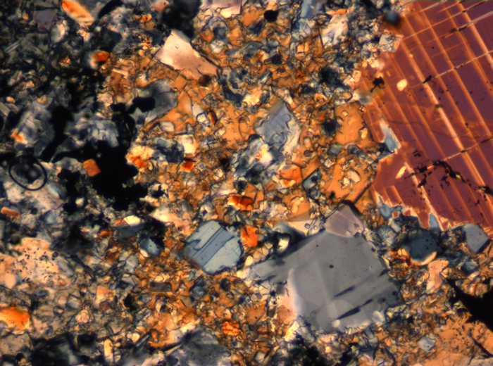 Thin Section Photograph of Apollo 16 Sample 65015,164 in Cross-Polarized Light at 2.5x Magnification and 2.85 mm Field of View (View #68)