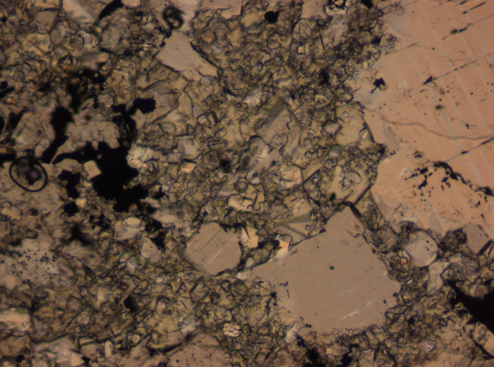 Thin Section Photograph of Apollo 16 Sample 65015,164 in Plane-Polarized Light at 2.5x Magnification and 2.85 mm Field of View (View #68)
