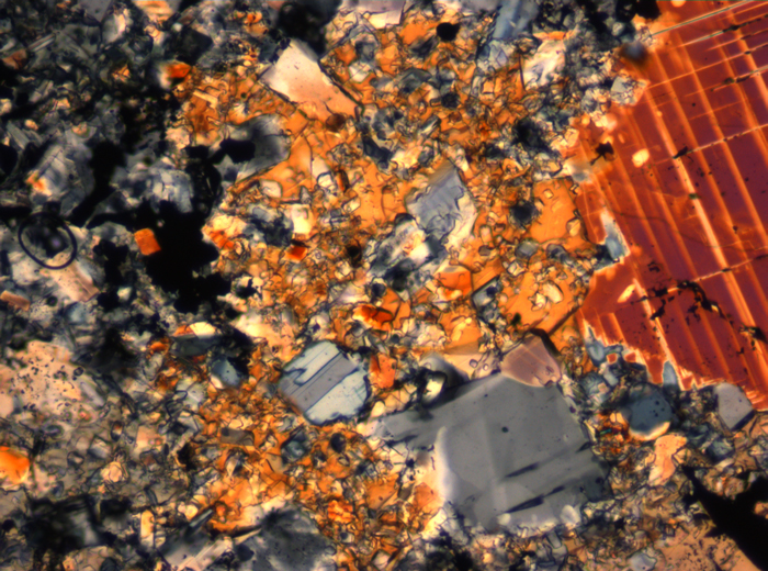 Thin Section Photograph of Apollo 16 Sample 65015,164 in Cross-Polarized Light at 2.5x Magnification and 2.85 mm Field of View (View #69)