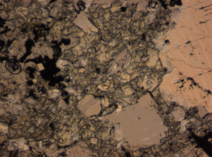 Thin Section Photograph of Apollo 16 Sample 65015,164 in Plane-Polarized Light at 2.5x Magnification and 2.85 mm Field of View (View #69)