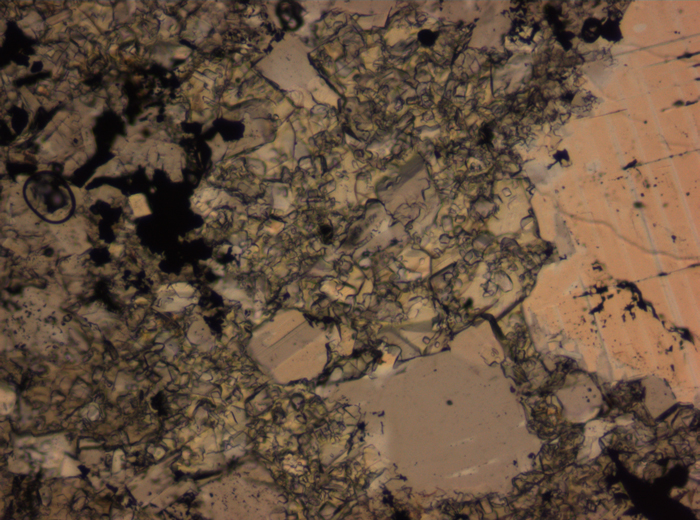 Thin Section Photograph of Apollo 16 Sample 65015,164 in Plane-Polarized Light at 2.5x Magnification and 2.85 mm Field of View (View #7)