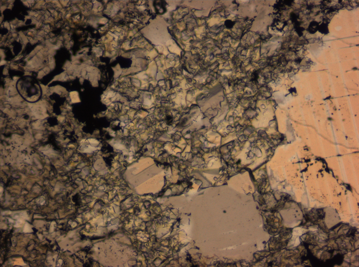 Thin Section Photograph of Apollo 16 Sample 65015,164 in Plane-Polarized Light at 2.5x Magnification and 2.85 mm Field of View (View #71)