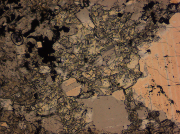 Thin Section Photograph of Apollo 16 Sample 65015,164 in Plane-Polarized Light at 2.5x Magnification and 2.85 mm Field of View (View #72)
