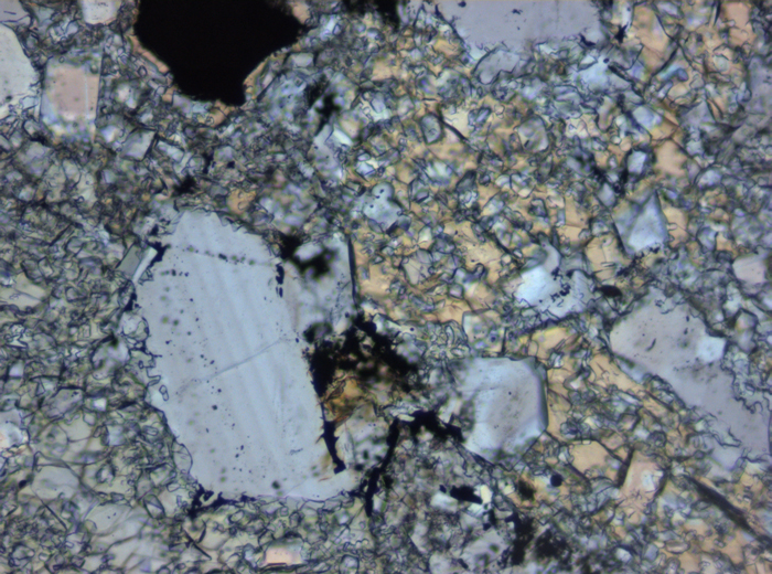 Thin Section Photograph of Apollo 16 Sample 65015,164 in Plane-Polarized Light at 10x Magnification and 1.15 mm Field of View (View #2)