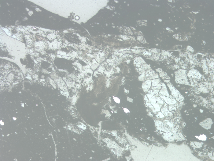 Thin Section Photograph of Apollo 16 Sample 68115,3 in Reflected Light at 5x Magnification and 2.3 mm Field of View (View #1)