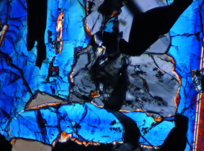 Thin Section Photograph of Apollo 17 Sample 70135,66 in Cross-Polarized Light at 10x Magnification and 0.7 mm Field of View (View #5)