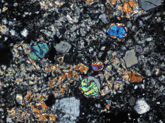 Thin Section Photograph of Apollo 17 Sample 76015,102 in Cross-Polarized Light at 10x Magnification and 0.7 mm Field of View (View #5)