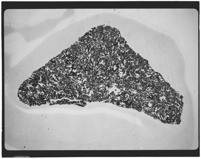 Black and white Thin Section photograph of Apollo 12 Sample(s) 12063,6 using cross nichols light.