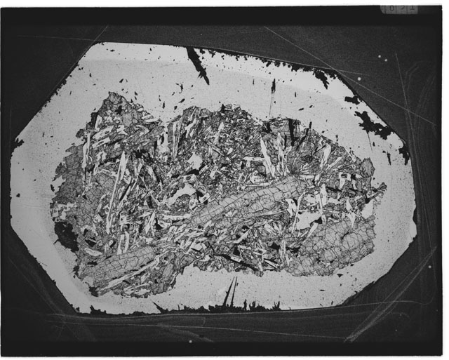 Black and white Thin Section photograph of Apollo 12 Sample(s) 12021,5 using cross Nichols light.