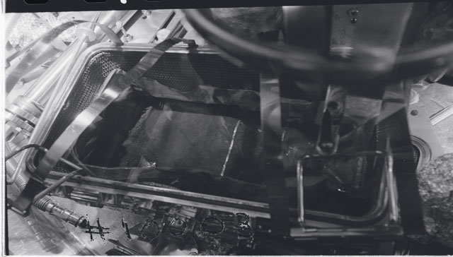Black and white photograph of Apollo 11 Sample(s) 10003; Processing photograph displaying a sample in rock box.