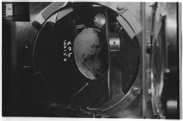 Black and white photograph of Apollo 11 Sample(s) 10017,0; Processing photograph in vacuum vault at R6P.