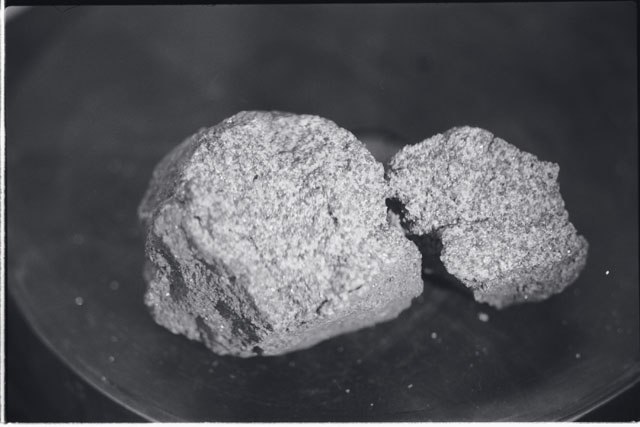 Black and white photograph of Apollo 11 Sample(s) 10044; Processing photograph displaying reconstruction.