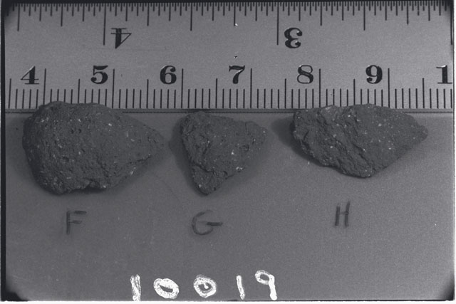 Black and white photograph of Apollo 11 Sample(s) 10019; Processing photograph displaying chips F,G,H.