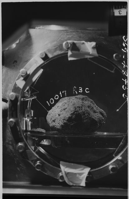 Black and white photograph of Apollo 11 Sample(s) 10017; Processing photograph in vacuum vault at R3C .