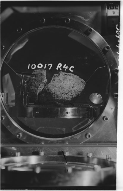 Black and white photograph of Apollo 11 Sample(s) 10017,5,6; Processing photograph in vacuum vault at R4C .