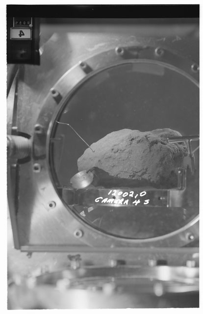 Black and white stereo photograph of Apollo 12 Sample 12002,0 using Camera IV angle S.