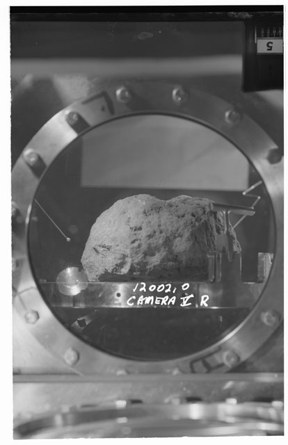 Black and white stereo photograph of Apollo 12 Sample 12002,0 using Camera V angle R.