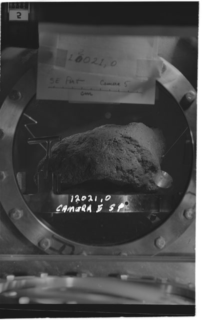 Black and white stereo photograph of Apollo 12 Sample 12021,0 using Camera V angle S.