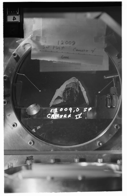 Black and white stereo photograph of Apollo 12 Sample 12009,0 using Camera IV angle S.