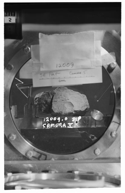 Black and white stereo photograph of Apollo 12 Sample 12009,0 using Camera V angle S.