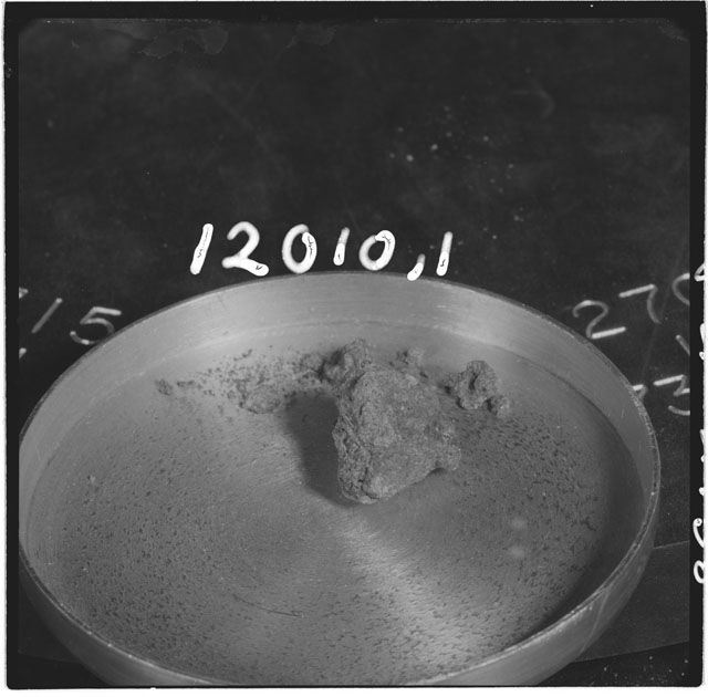 Black and white photograph of Apollo 12 Sample(S) 12010,1; Processing photograph displaying  chips and fines.