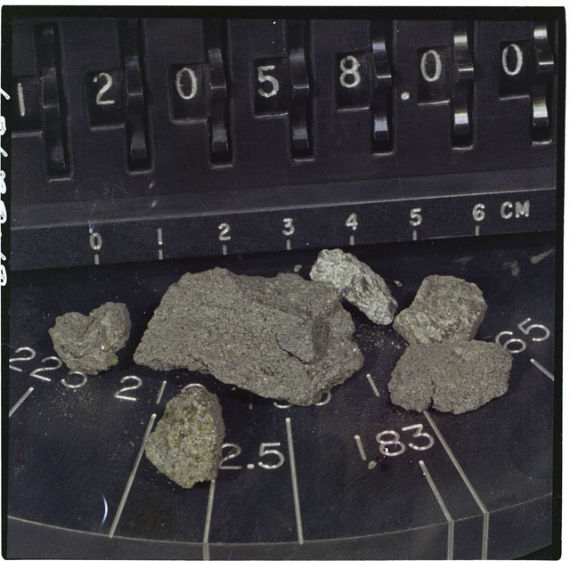 Color photograph of Apollo 12 Sample(S) 12052,58; Processing photograph displaying the sample renamed from 12058.