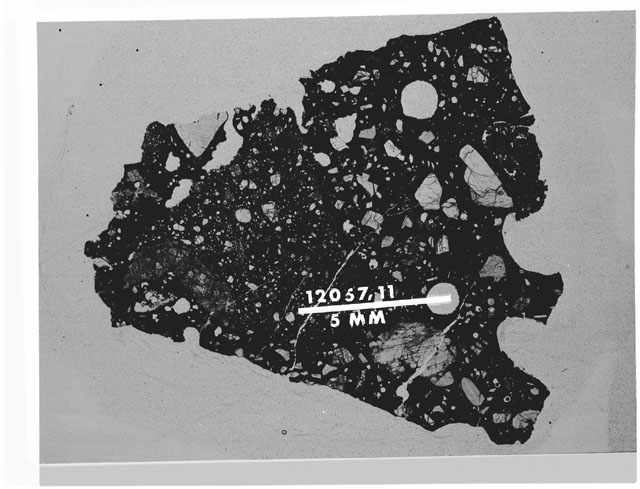 Black and white Thin Section photograph of Apollo 12 Sample(s) 12057,23 using transmitted light.
