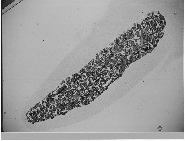 Black and white Thin Section photograph of Apollo 12 Sample(s) 12057,17 using cross nichols light.