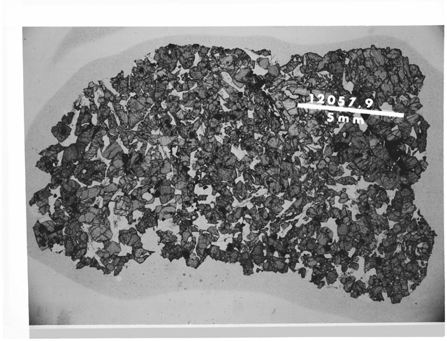 Black and white Thin Section photograph of Apollo 12 Sample(s) 12057,21 using cross nichols light.