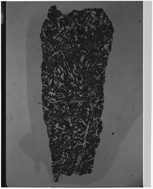 Black and white Thin Section photograph of Apollo 12 Sample(s) 12057,18 using cross nichols light.