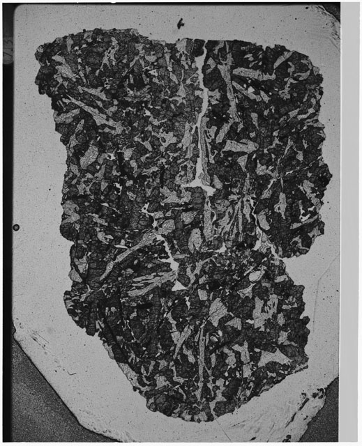 Black and white Thin Section photograph of Apollo 12 Sample(s) 12057,14 using cross nichols light.