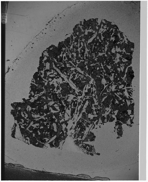 Black and white Thin Section photograph of Apollo 12 Sample(s) 12057,15 using cross nichols light.