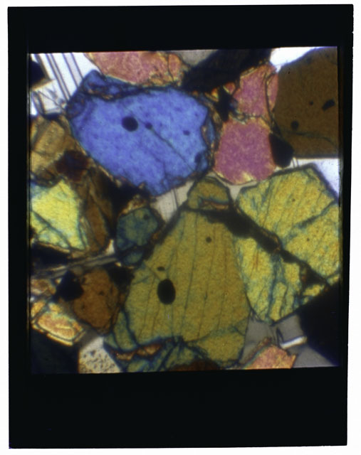 Color Thin Section photograph of Apollo 12 Sample(s) 12057,21 using cross nichols light.