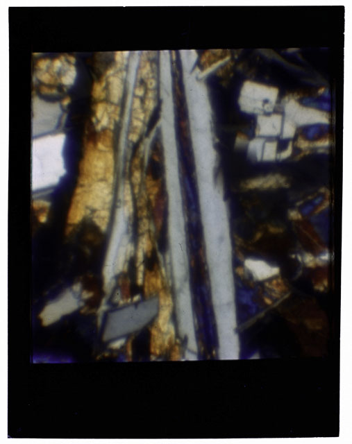 Color Thin Section photograph of Apollo 12 Sample(s) 12057,18 using cross nichols light.