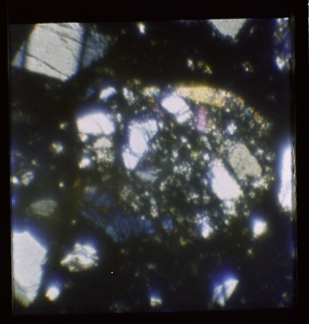 Color Thin Section photograph of Apollo 12 Sample(s) 12057,23 using cross nichols light.