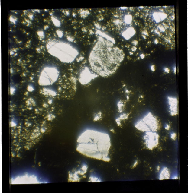 Color Thin Section photograph of Apollo 12 Sample(s) 12057,23 using cross nichols light.