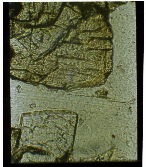 Color Thin Section photograph of Apollo 12 Sample(s) 12057,19 using transmitted light.