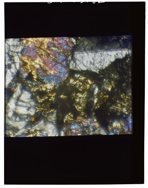 Color Thin Section photograph of Apollo 12 Sample(s) 12057,14 using cross nichols light.